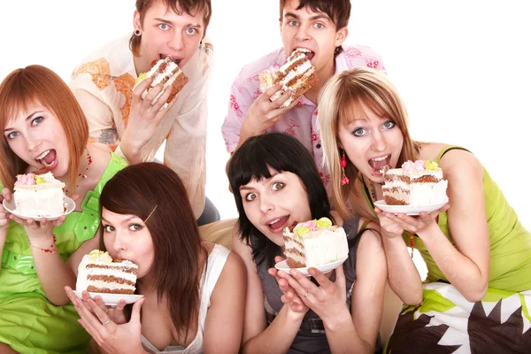 Skupina happy mladých s dortem. — Stock fotografie