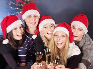 Group young in santa hat. clipart