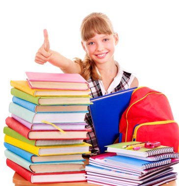 Child with stack of books and showing thumb up. clipart