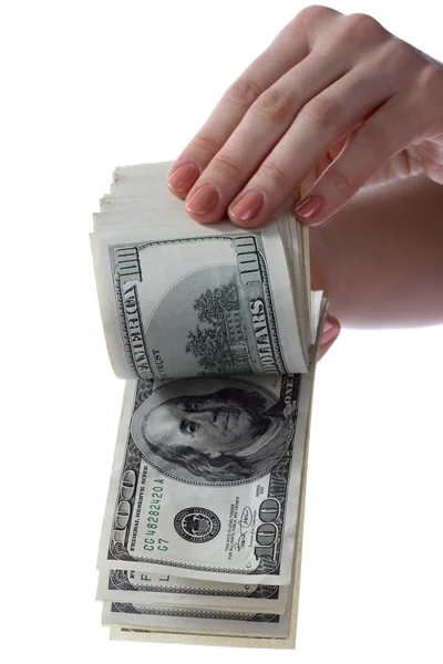 Pengar i kvinnliga händer. isolerade. — Stockfoto