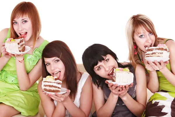 Fiatal nő enni tortát csoportja. — Stock Fotó