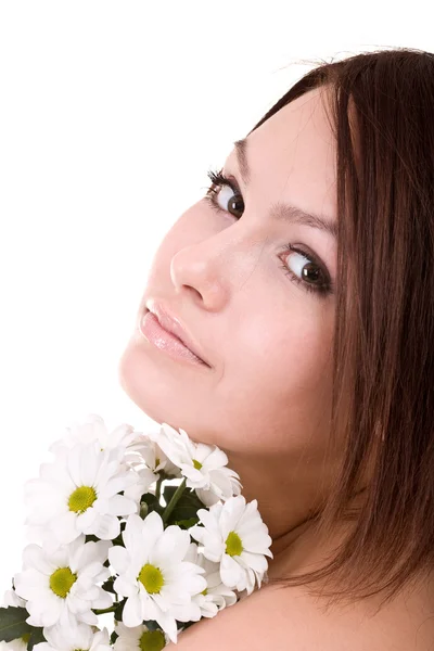 Mooi meisje met bloem. gezichtsmassage. — Stockfoto