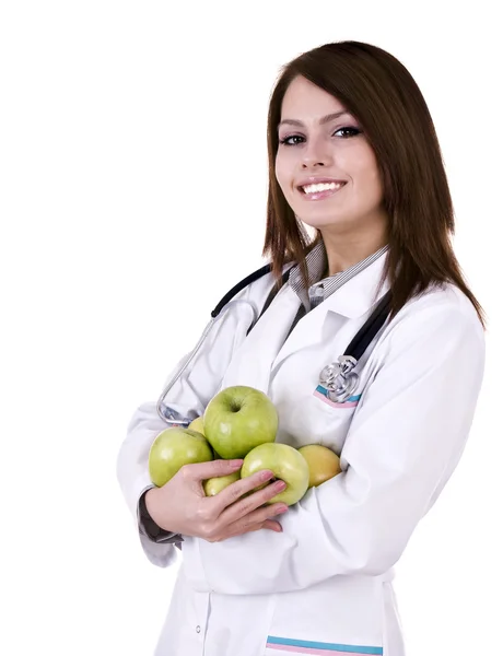 Dokter met stethoscoop en groep groene appels. — Stockfoto