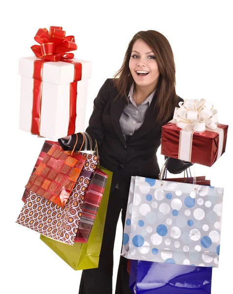 Mädchen im Business-Anzug mit Gruppe Geschenkbox und Tasche. — Stockfoto