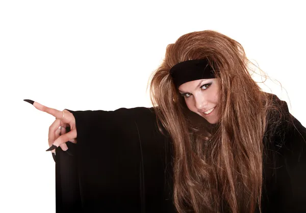 Witch in black costume and long hair point claw finger. — Stock Photo, Image