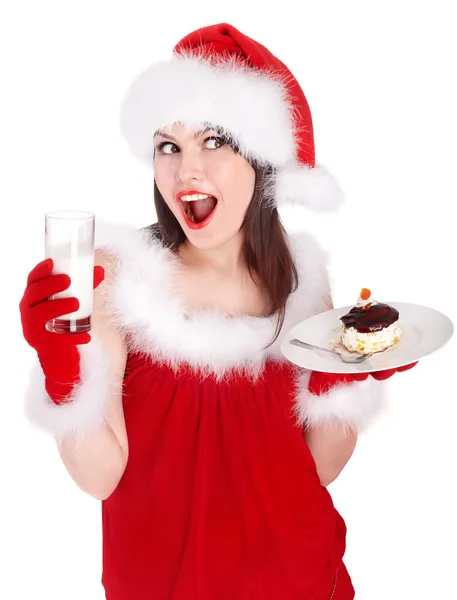Ragazza in cappello rosso Santa mangiare torta sul piatto . — Foto Stock