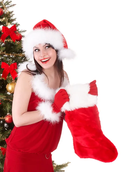 Christmas flicka i santa hatt, strumpa, träd. — Stockfoto
