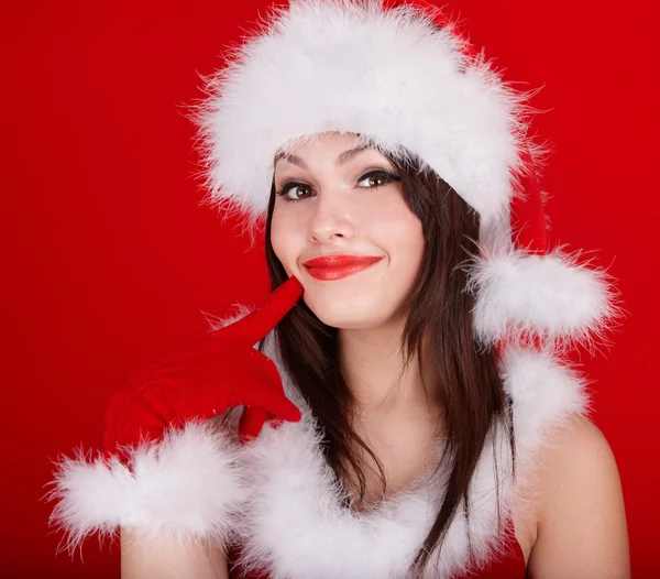Vánoční dívka v červeném klobouku santa. — Stock fotografie
