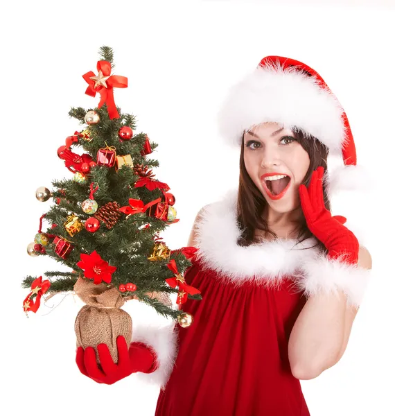 Vánoční dívka v santa hat s malým strom v ruce. — Stock fotografie