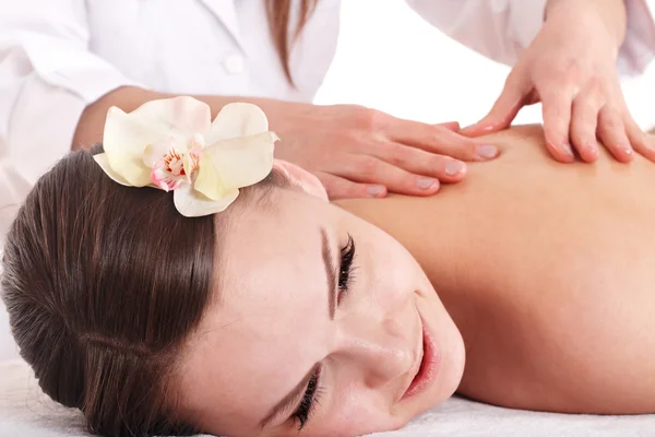 Beautiful white girl having thai massage. — Stock Photo, Image