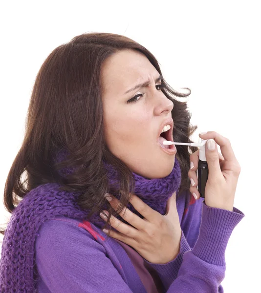 Woman using throat spray. — Stock Photo, Image
