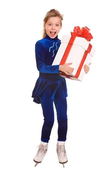 Child girl sport figure skating in white skate with gift box. — Stock Photo, Image