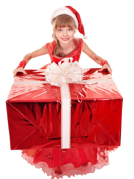 Dítě v santa hat drží červené krabičky. — Stock fotografie