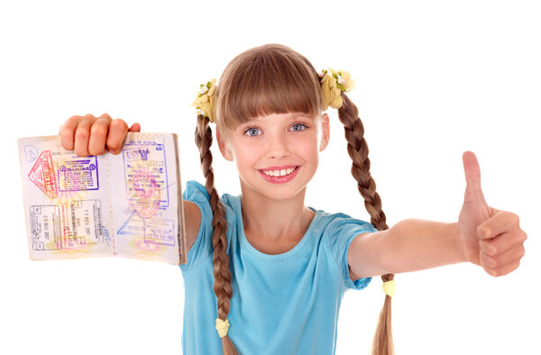 Child holding passport.