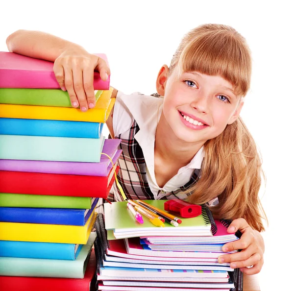 Escola criança segurando pilha de livros . — Fotografia de Stock