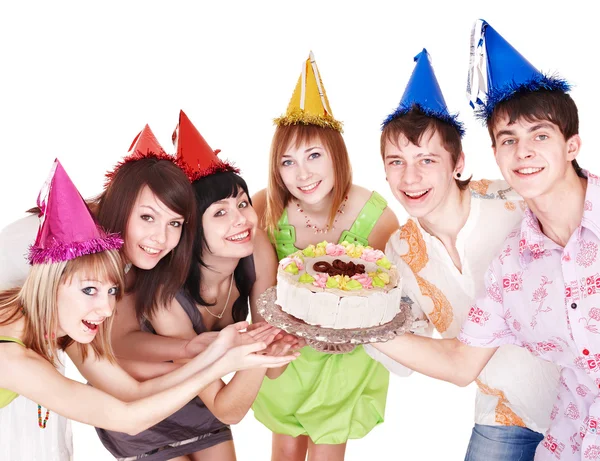 Group in party hat eat cake. Royalty Free Stock Photos