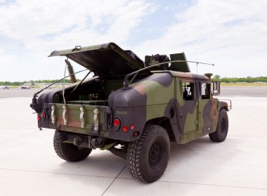 Army camouflaged Humvee truck clipart