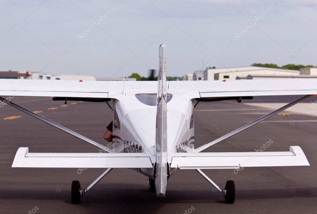 Small private plane from rear