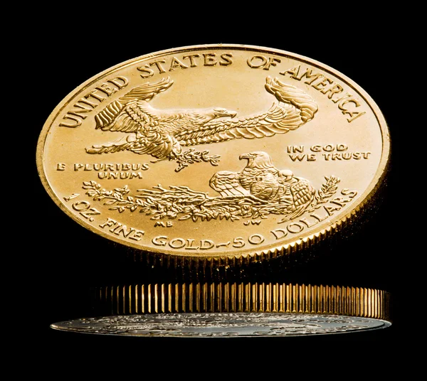 Macro image of gold eagle coin — Stock Photo, Image