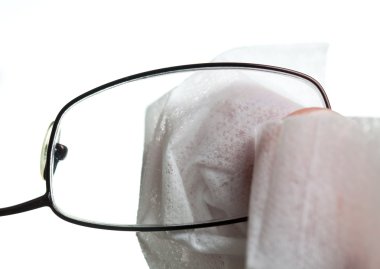 Cleaning glasses with cloth clipart