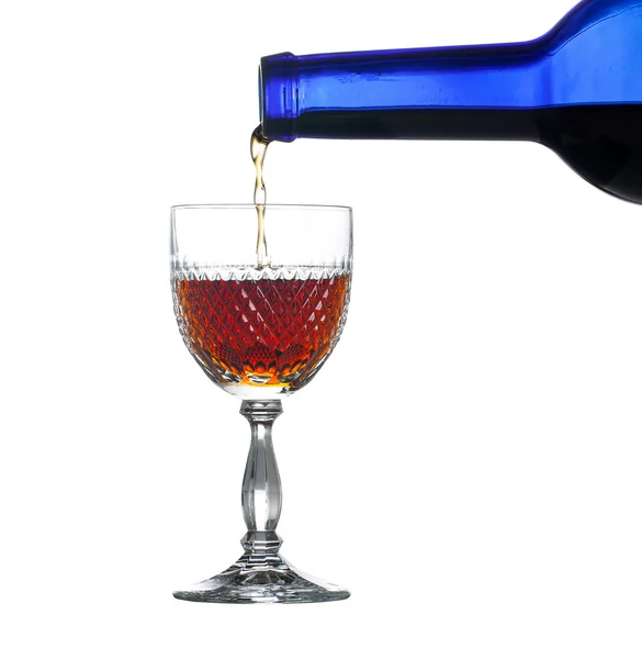 Sherry of poort wordt gegoten in glas — Stockfoto