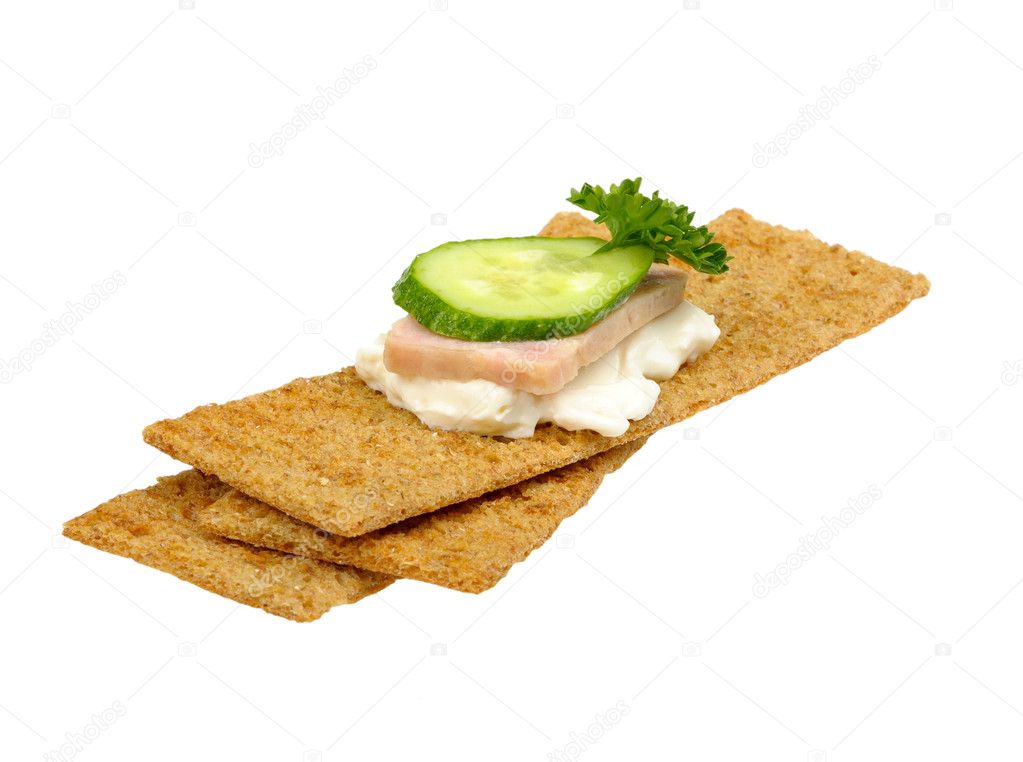 Crispbread with curd cheese pickles ham and parsley