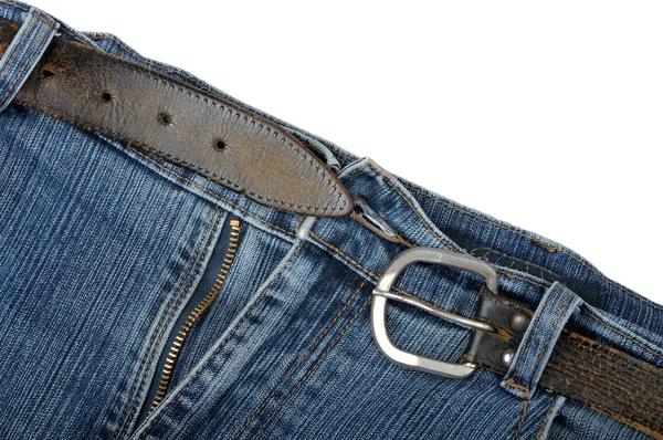 Старые джинсы и пояс — стоковое фото