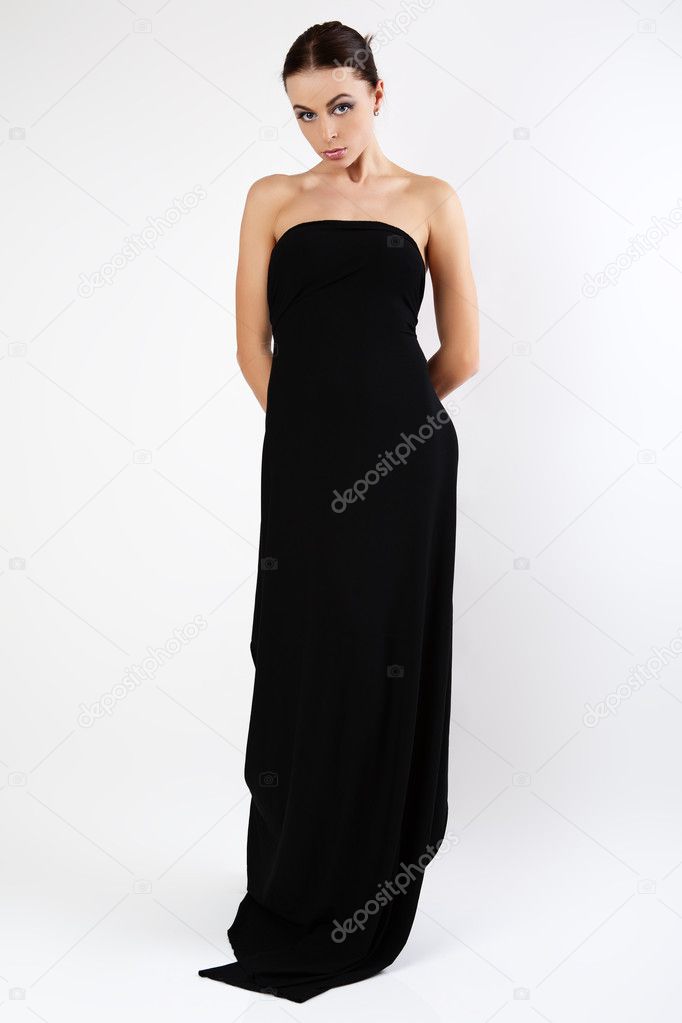 Beautiful young woman in the black dress.