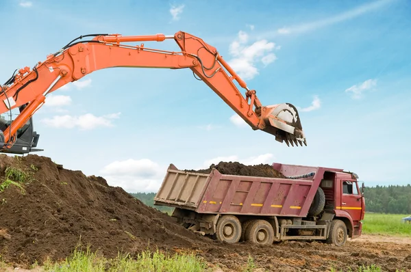 Excavator loader and dumper truck — Stock Photo, Image