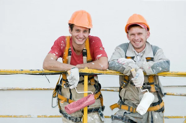 Happy builder homlokzat festők — Stock Fotó