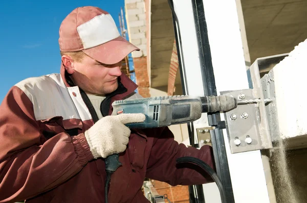 Builder with drill — Stock Photo, Image