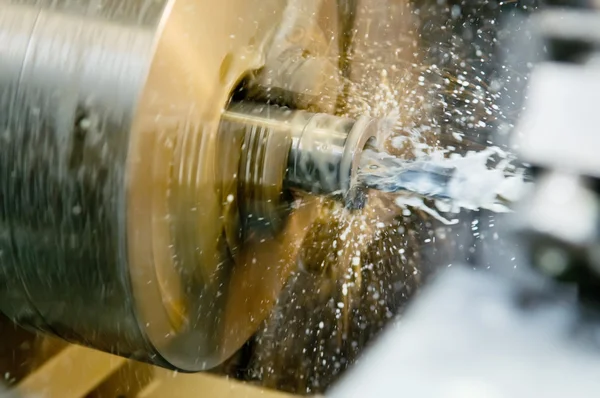 Drilling a hole in blank on turning machine — Stock Photo, Image