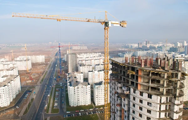 Column tower crane over construction area — Stock Photo, Image