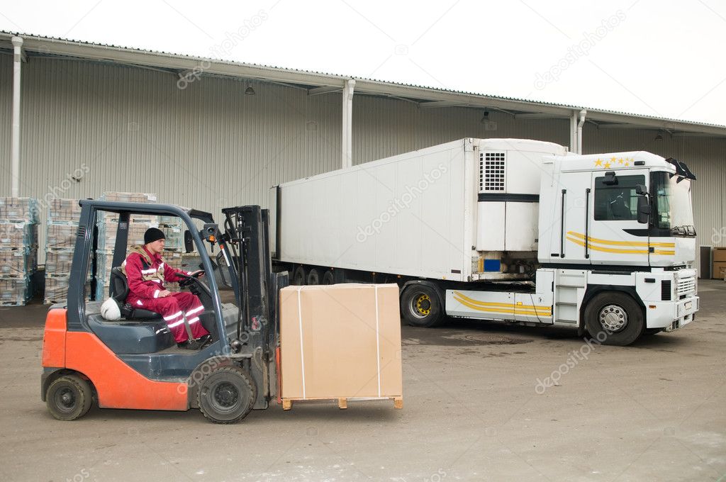 Forklift loader at warehouse outdoors