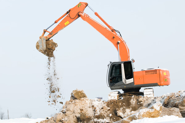 Excavator loader at winter works