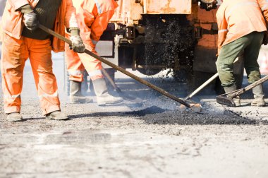 Asphalt paving works clipart