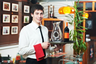 Waiter in uniform at restaurant clipart