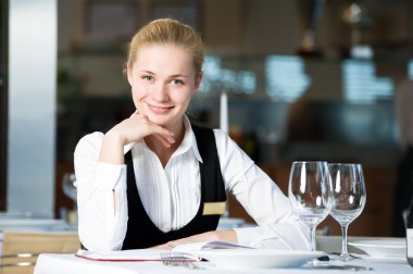 Restaurant manager woman at work place clipart