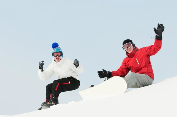 Heureux sportif avec snowboards — Photo