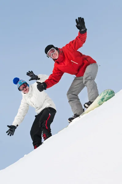 Šťastný sportovec s snowboardy — Stock fotografie