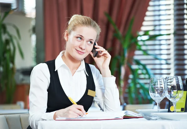 Restaurant manager woman at work place Stock Photo