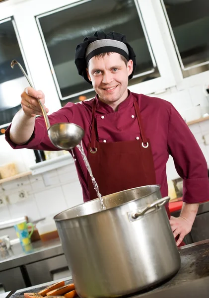 Chef with scoop — Stock Photo, Image