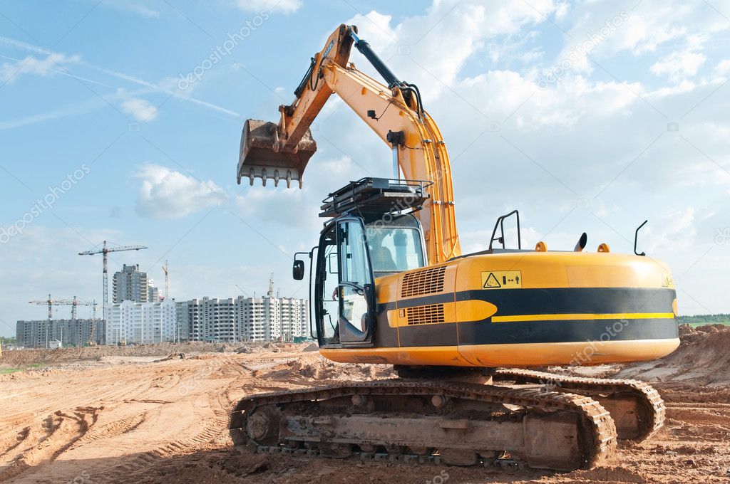 Track-type loader excavator at construction area