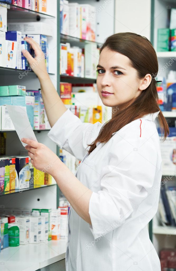 Pharmacy chemist woman in drugstore — Stock Photo © kalinovsky #5457115