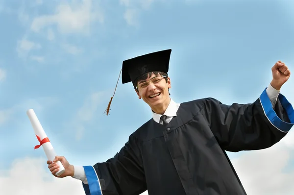 Feliz estudante de pós-graduação em vestido — Fotografia de Stock