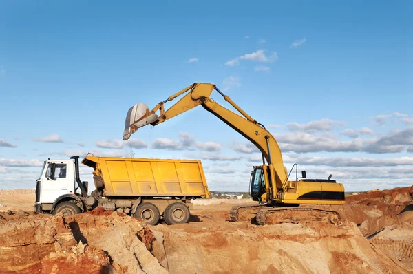 Track-type loader excavator and tipper dumper — Stock Photo, Image