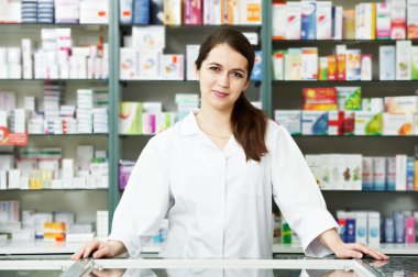 Pharmacy chemist woman in drugstore clipart