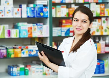 Pharmacy chemist woman in drugstore clipart