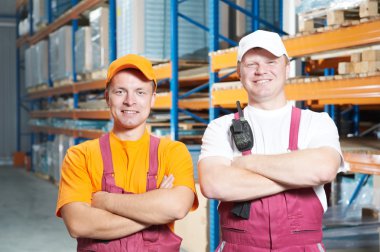 Manual workers crew in warehouse clipart