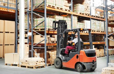 Worker driver at warehouse forklift loader works clipart